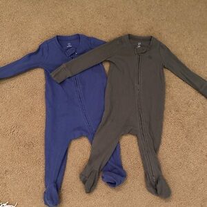 Two lightly used Baby Gap footed one-piece.